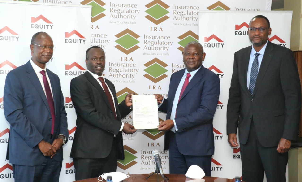 Mr. James Mwangi,CBS Group Managing Director & CEO of Equity Group Holdings being presented with a Life Insurance Licence by the Commissioner of Insurance & CEO, IRA.